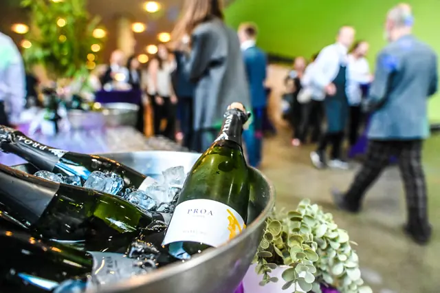 Bottles of bubbly on ice in the foyer as the first guests arrive.