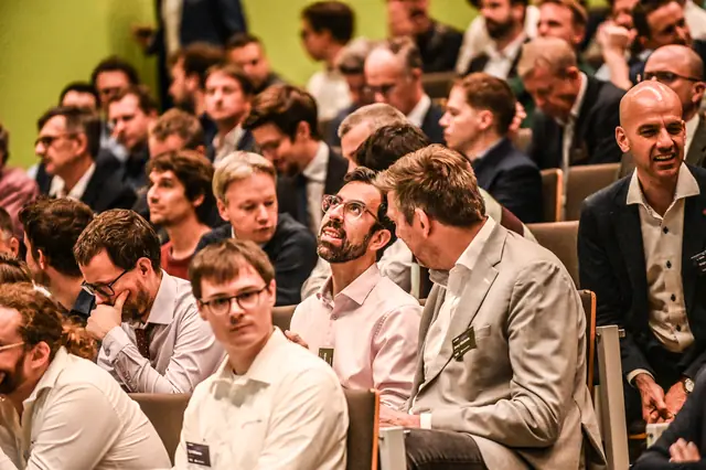 The audience seated in the aula.