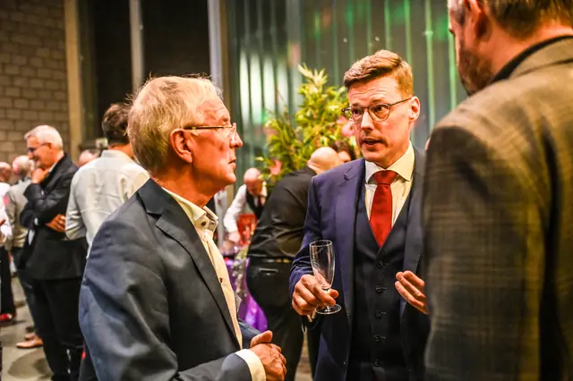 A host talking with a guest.