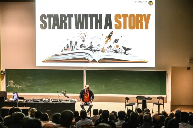 Rik Vera on stage under the slide “Start with a story”.