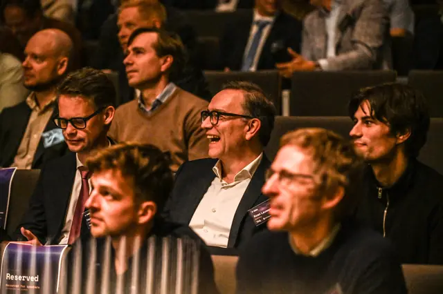 The audience laughing during the keynote.