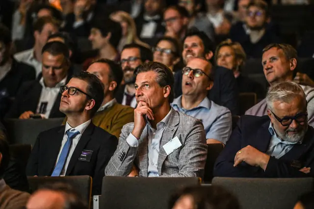 The audience listening to the keynote.