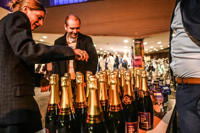 Rows of champagne bottles ready for the drinks.
