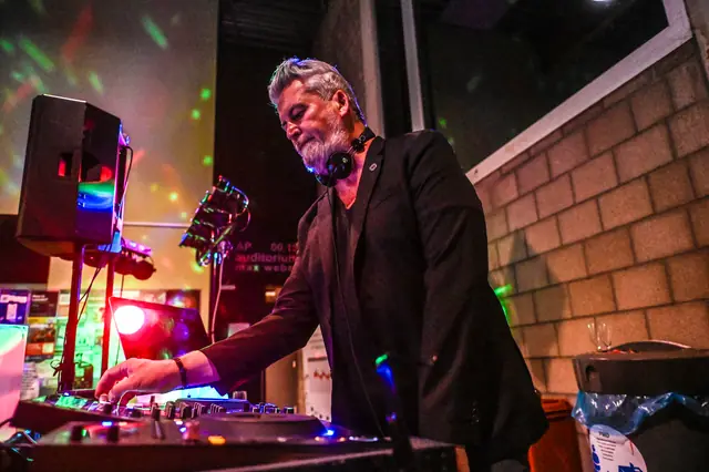 The DJ at the decks.